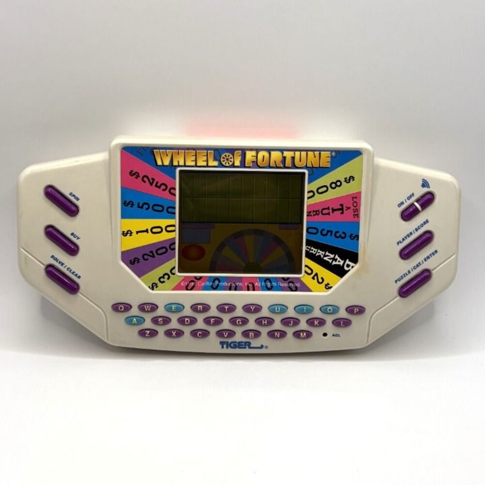 Vintage Wheel of Fortune Electronic Game w/ Cartridge Complete Works Tiger 1995